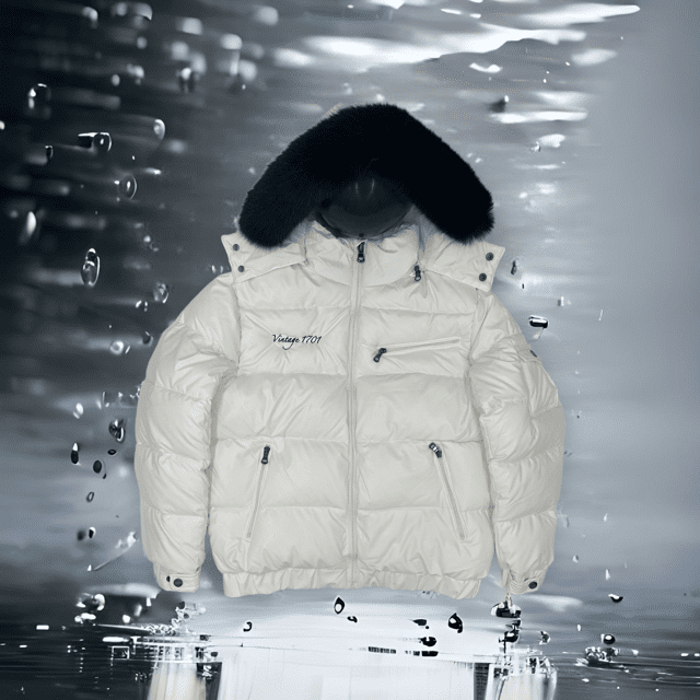 white puffer jacket, black shield, front